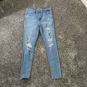 Distressed Blue Jeans